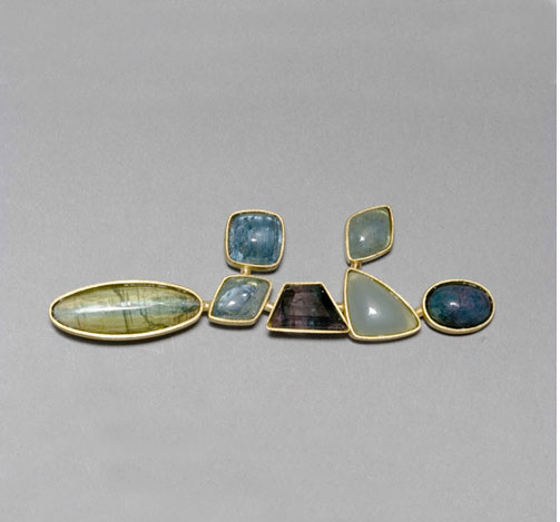 Broche oro 750 aguamarinas espesartina turmalinas turmalinas paracaiba topacio azul