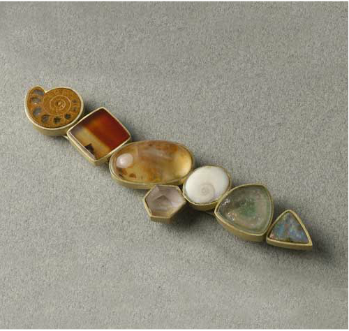 Broche oro opalo agata cuarzo dendrita ojo de santa lucia amonite ametrino turmalina